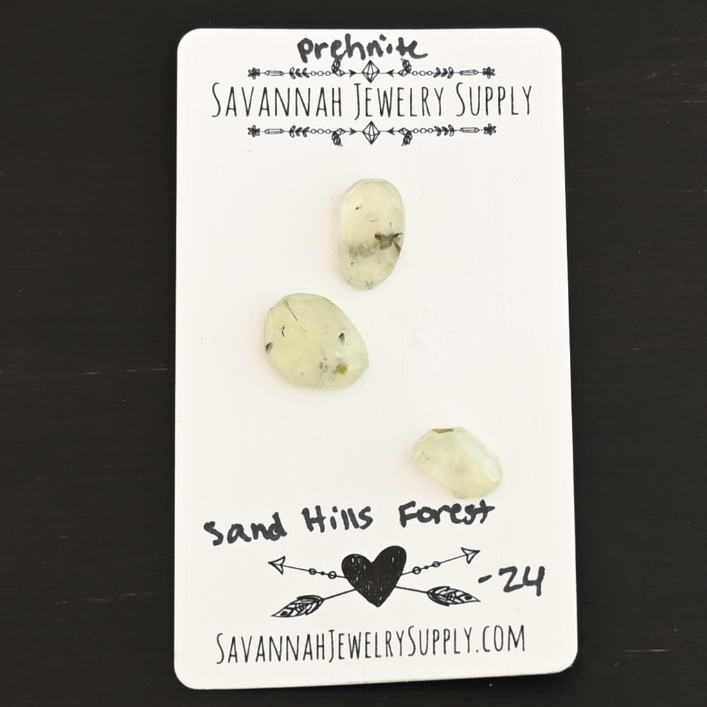 Sand Hills Forest Rose Cut Prehnite Cabochon Parcel shown on business card