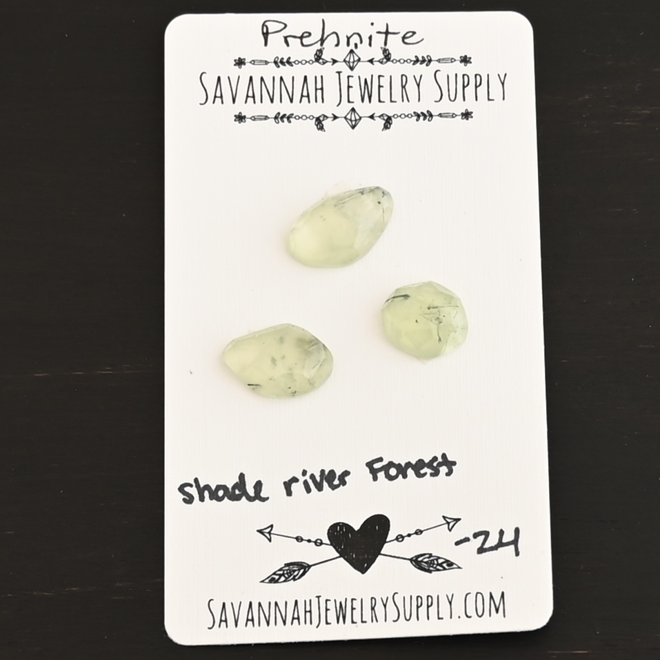 Shade River Forest Rose Cut Prehnite Cabochon Parcel shown on business card