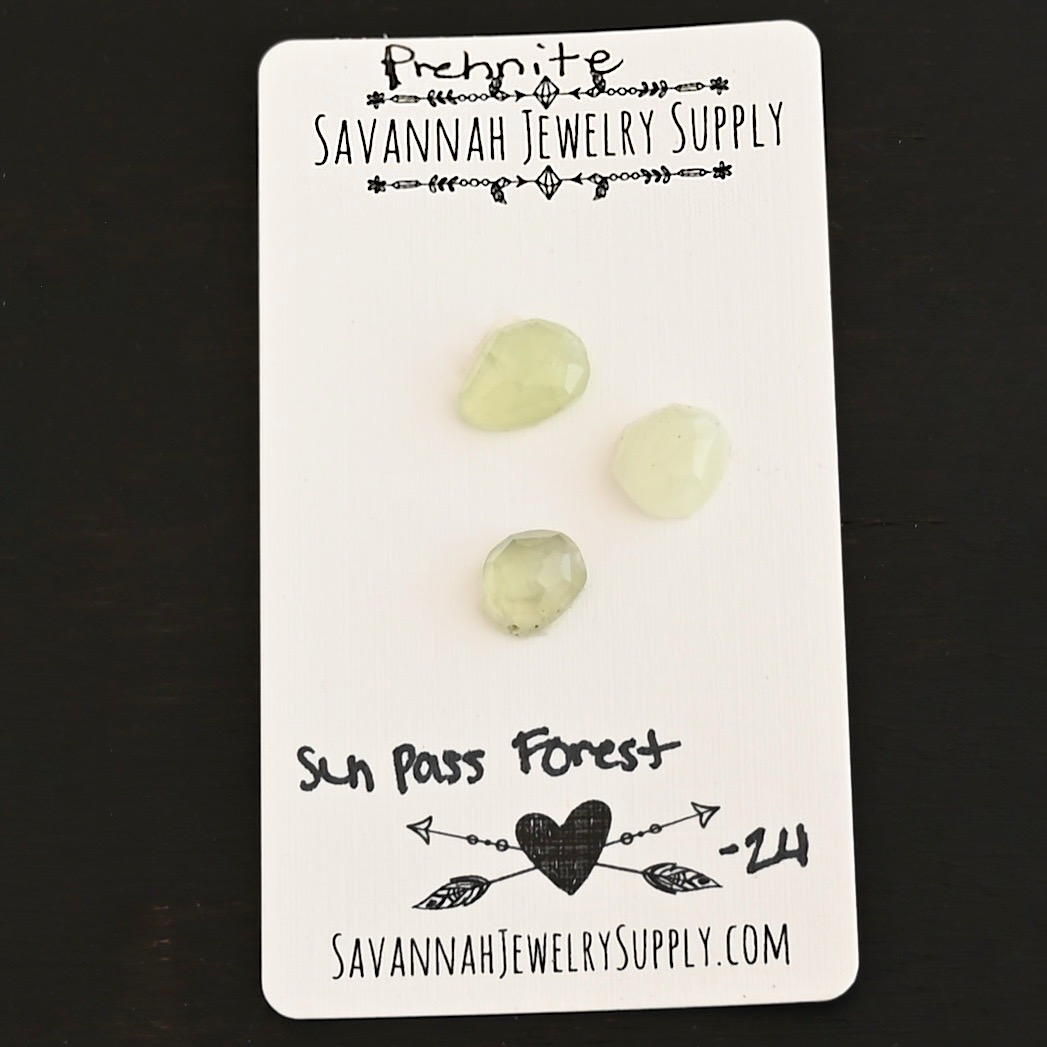 Sun Pass Forest Rose Cut Prehnite Cabochon Parcel shown on business card