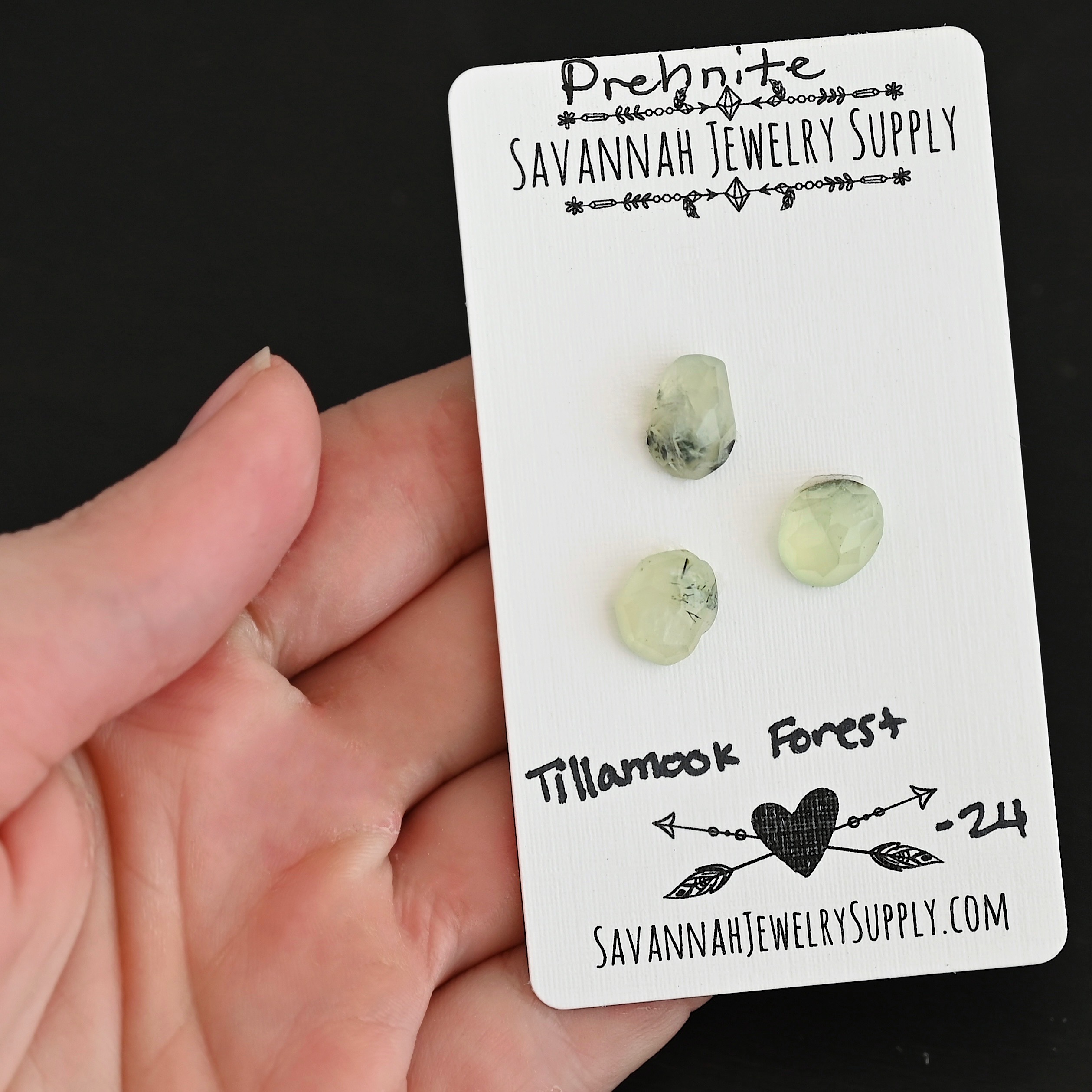 Tillamook Forest Rose Cut Prehnite Cabochon Parcel shown in hand