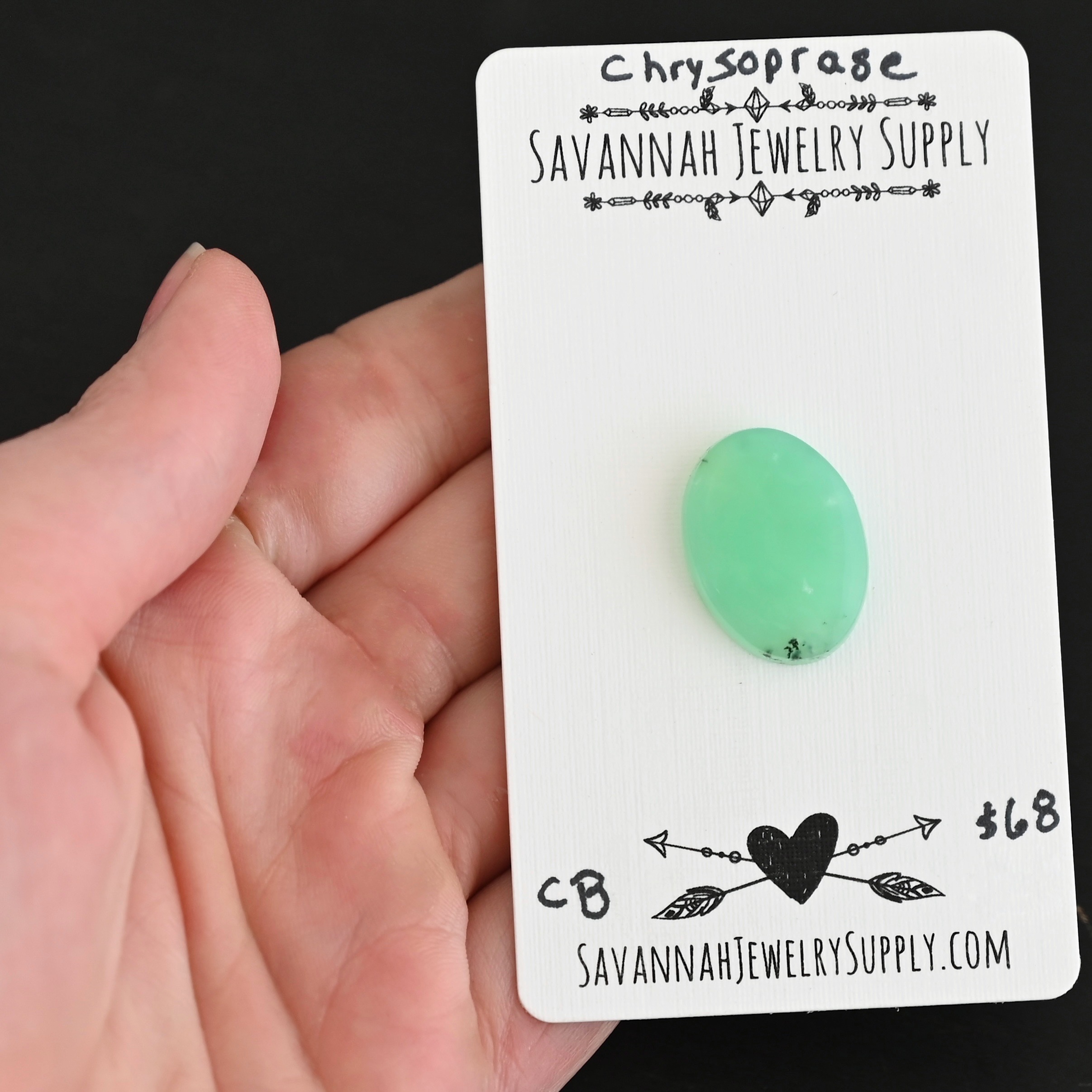 CB Chrysoprase Cabochon Parcel shown in hand