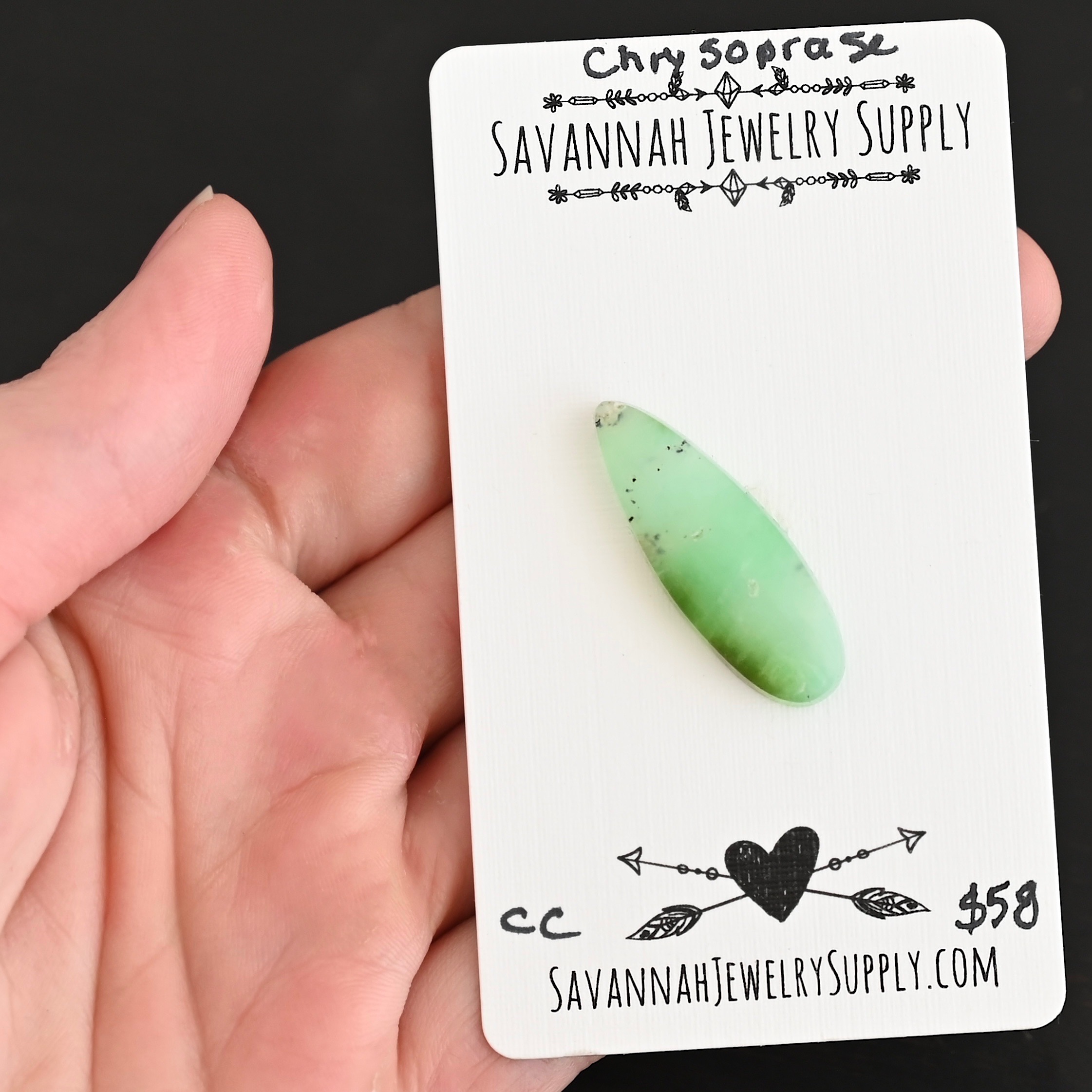 CC Chrysoprase Cabochon Parcel shown in hand