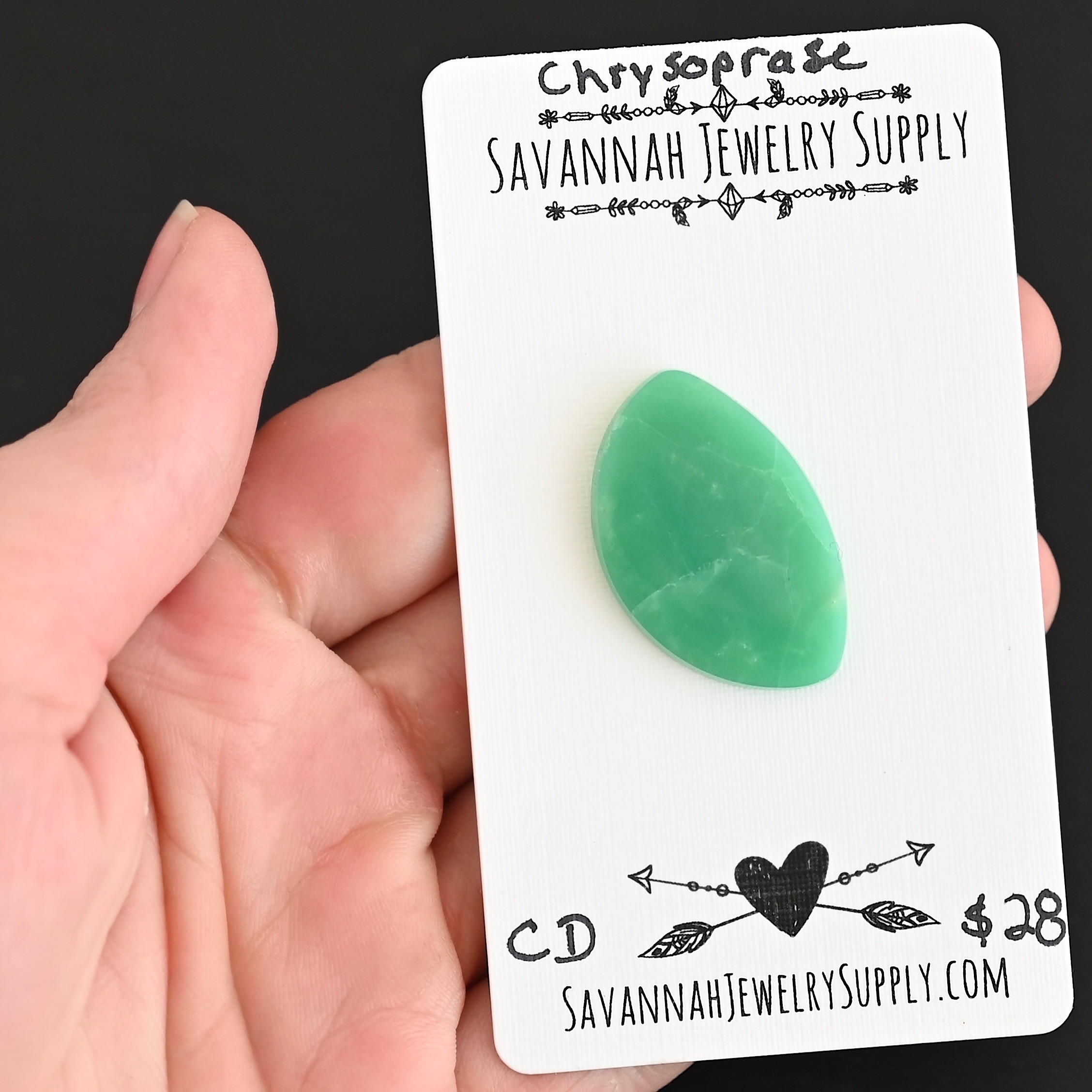 CD Chrysoprase Cabochon Parcel shown in hand