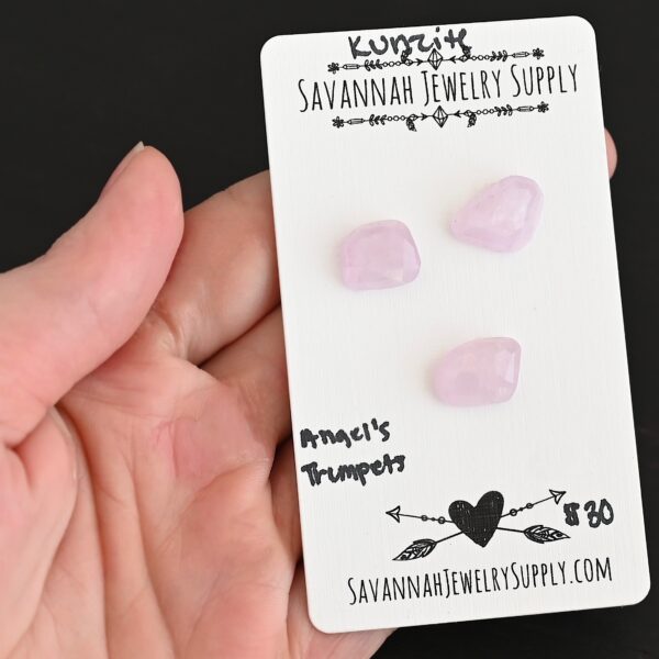 Angel's Trumpets Rose Cut Kunzite Cabochon Parcel shown in hand