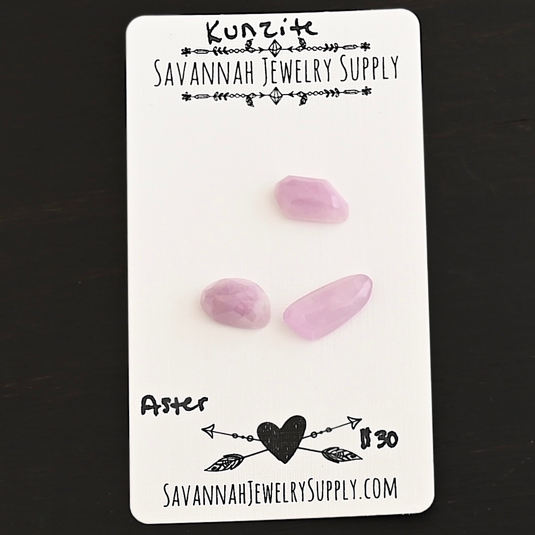 Aster Rose Cut Kunzite Cabochon Parcel shown on business card