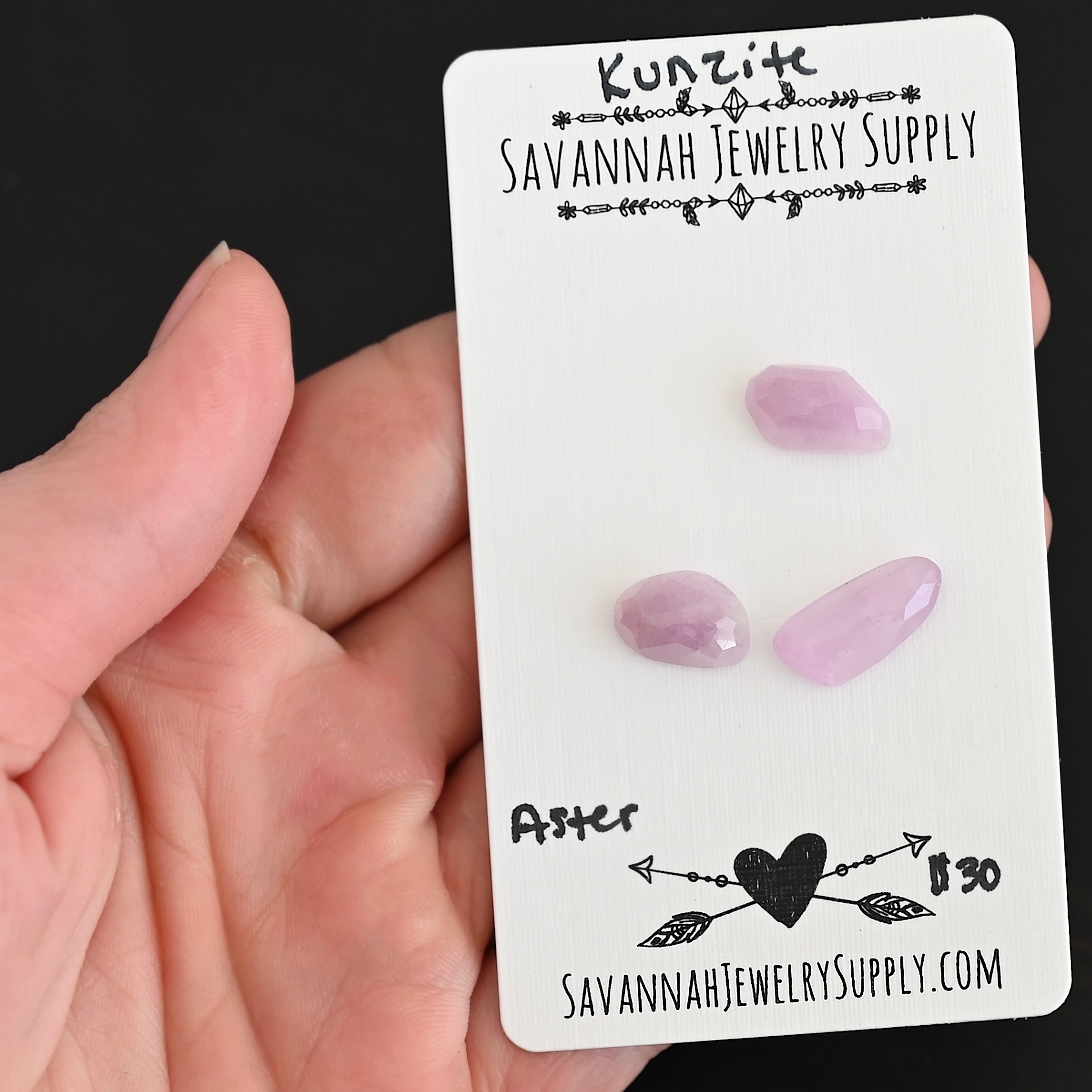 Aster Rose Cut Kunzite Cabochon Parcel shown in hand