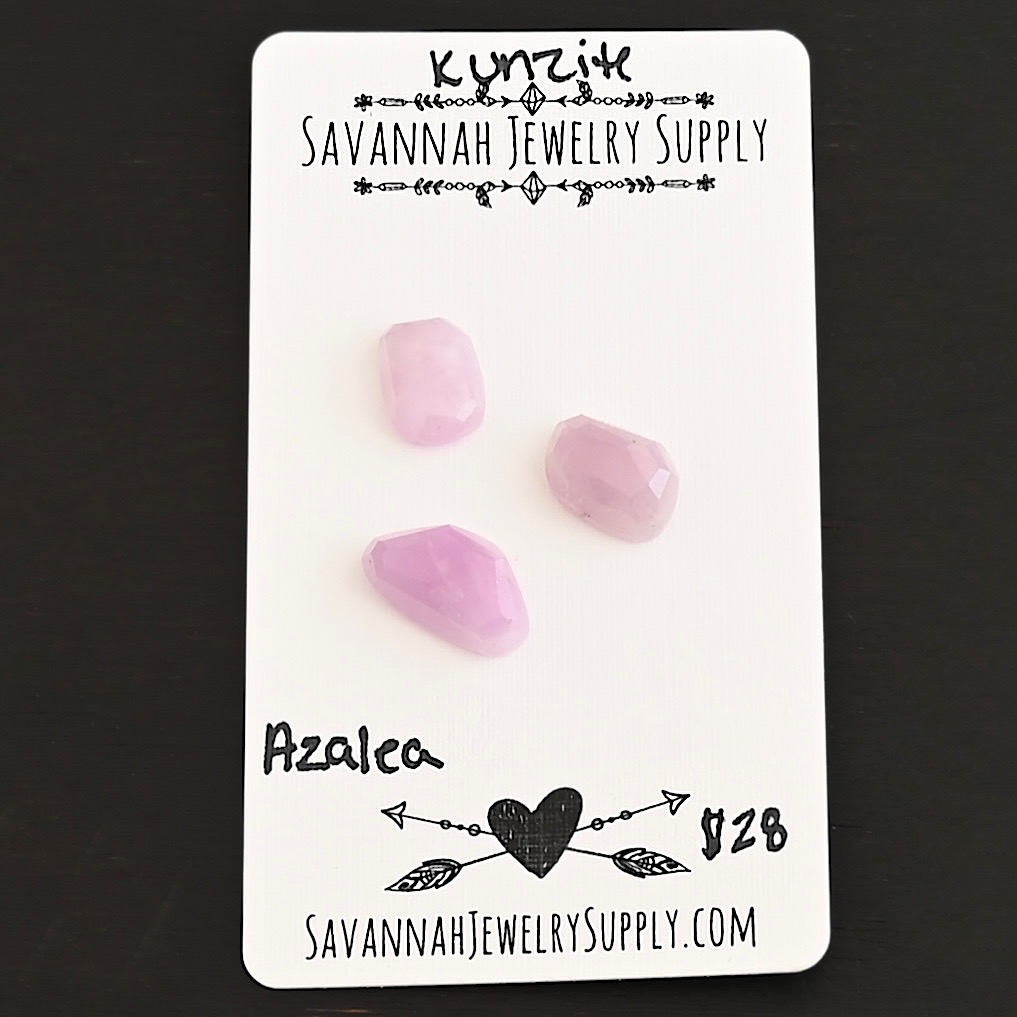 Azalea Rose Cut Kunzite Cabochon Parcel shown on business card