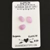 Begonia Rose Cut Kunzite Cabochon Parcel shown on business card