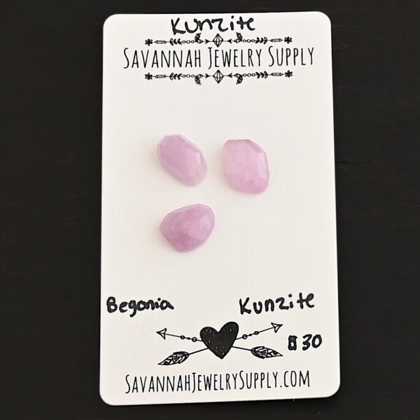 Begonia Rose Cut Kunzite Cabochon Parcel shown on business card