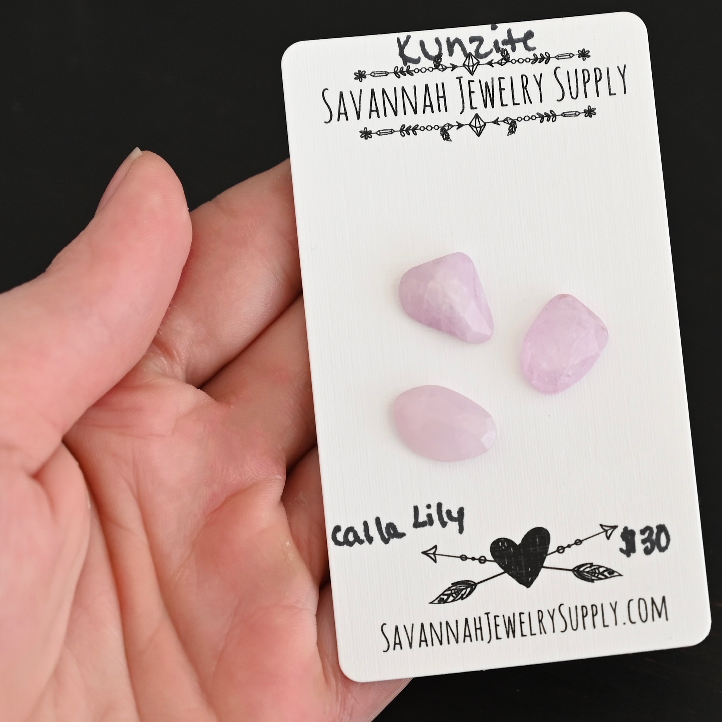 Calla Lily Rose Cut Kunzite Cabochon Parcel shown in hand