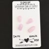 Daisy Rose Cut Kunzite Cabochon Parcel shown on business card
