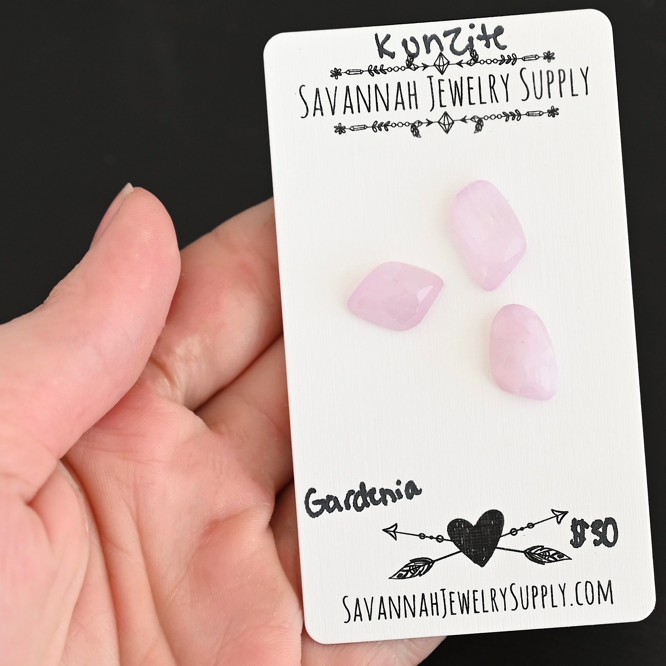 Gardenia Rose Cut Kunzite Cabochon Parcel shown in hand