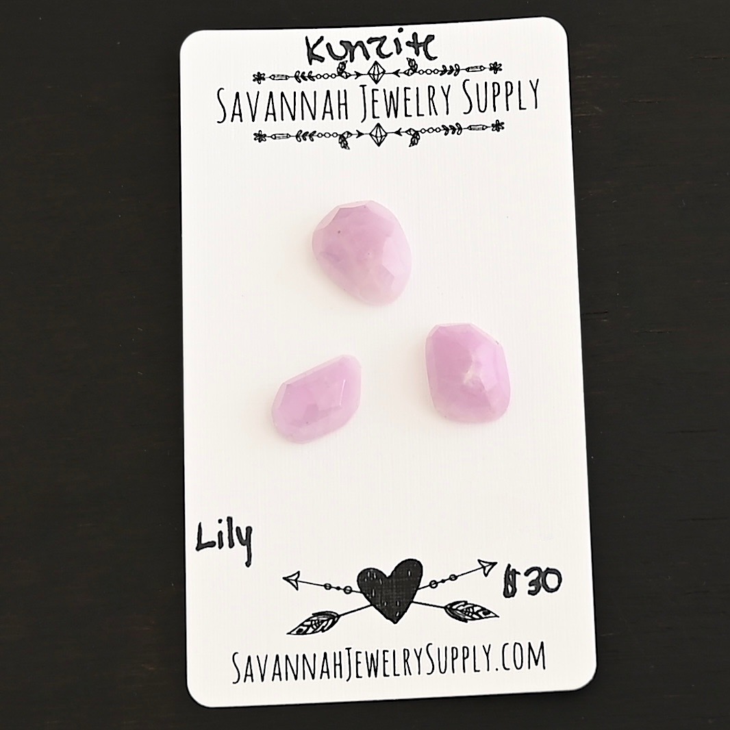 Lily Rose Cut Kunzite Cabochon Parcel shown on business card