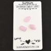 Lotus Rose Cut Kunzite Cabochon Parcel shown on business card