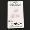 Medinilla Rose Cut Kunzite Cabochon Parcel shown on business card
