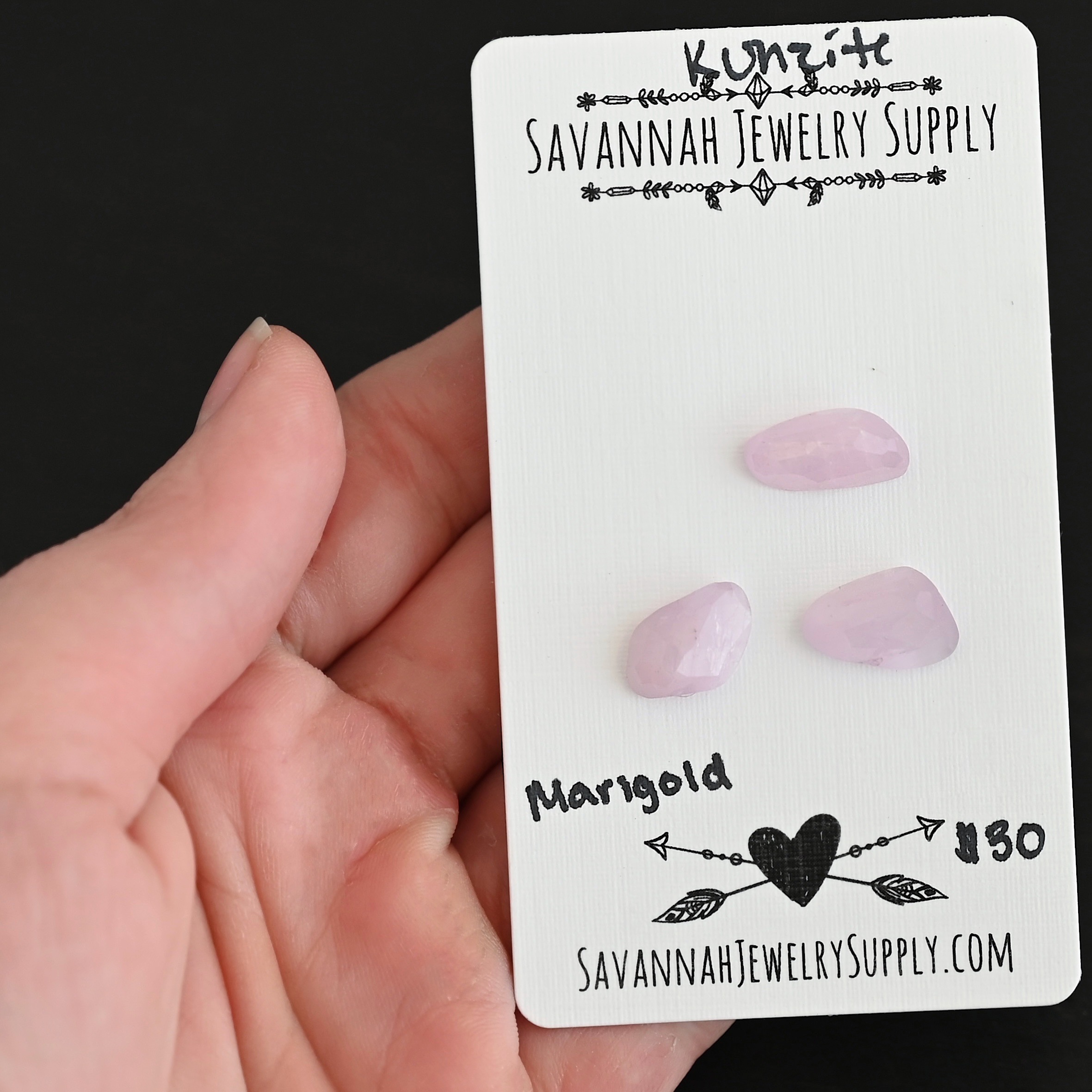 Marigold Rose Cut Kunzite Cabochon Parcel shown in hand