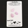 Moss Rose Rose Cut Kunzite Cabochon Parcel shown on business card