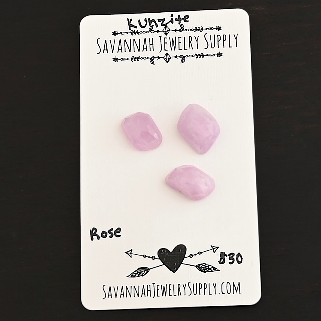 Rose Rose Cut Kunzite Cabochon Parcel shown on business card