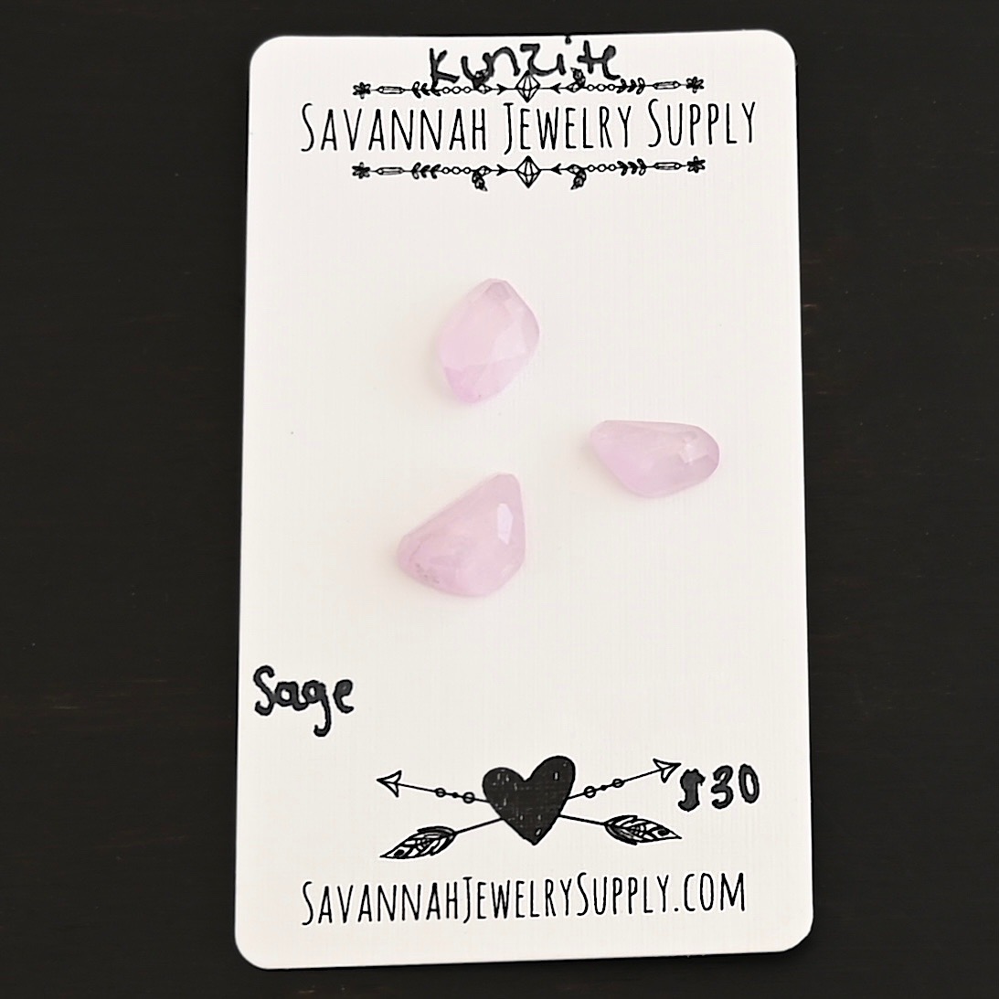 Sage Rose Cut Kunzite Cabochon Parcel shown on business card