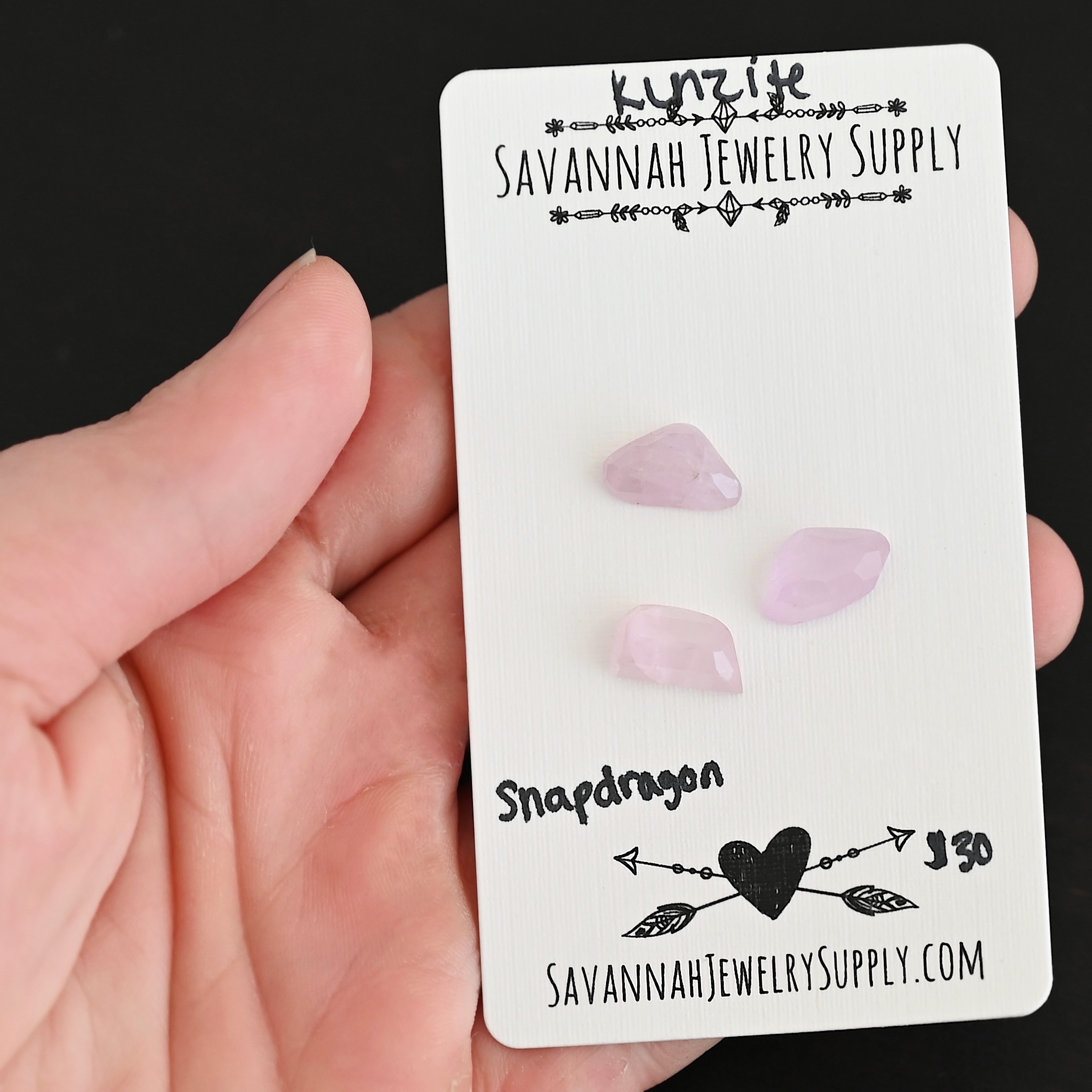 Snapdragon Rose Cut Kunzite Cabochon Parcel shown in hand