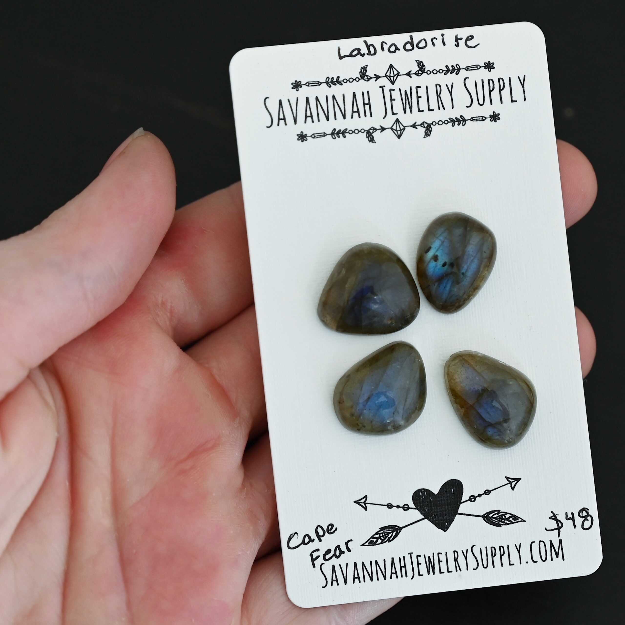 Cape Fear Labradorite Cabochon Parcel shown in hand