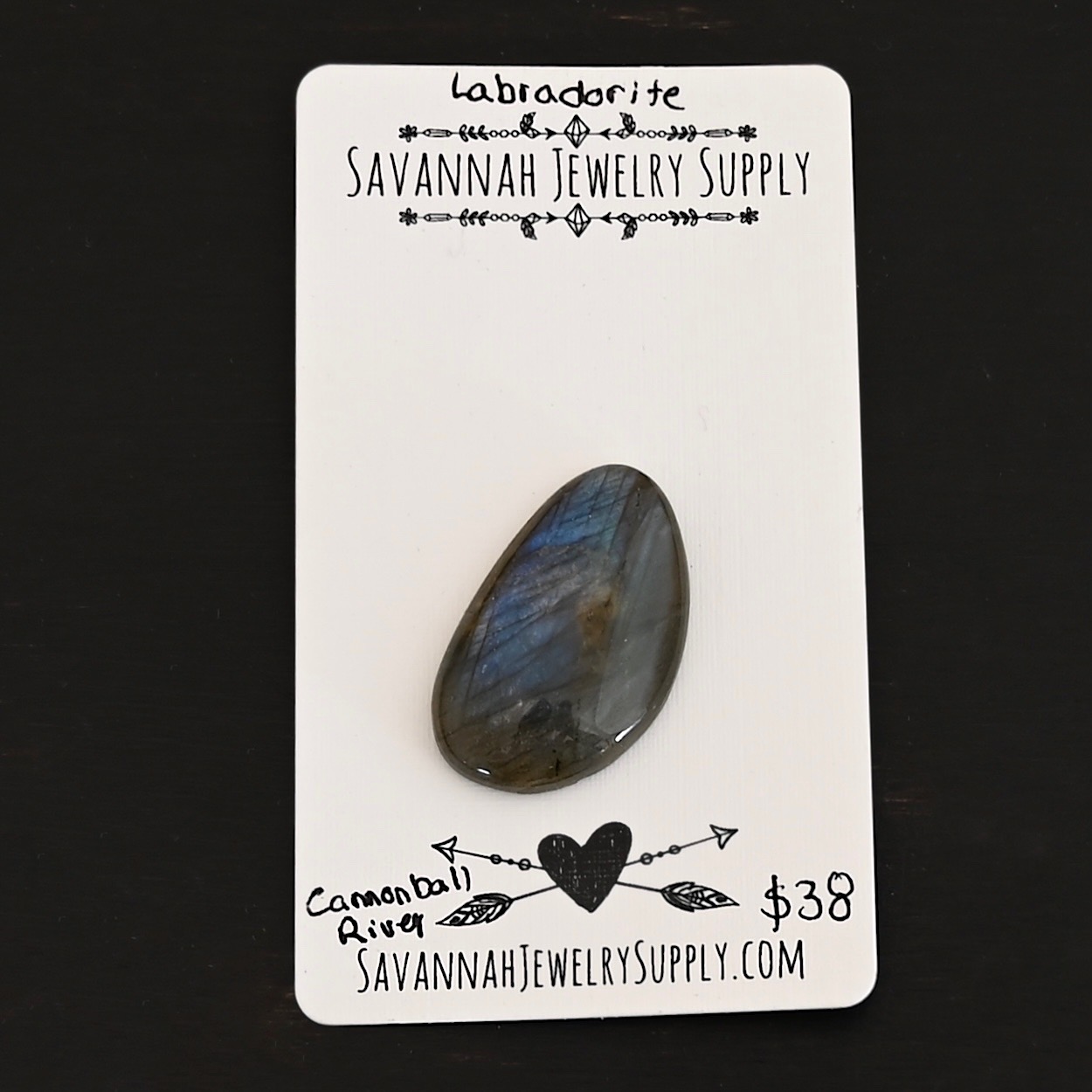 Cannonball River Labradorite Cabochon Parcel shown on business card