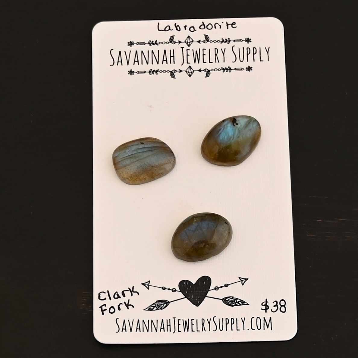 Clark Fork River Labradorite Cabochon Parcel shown on business card