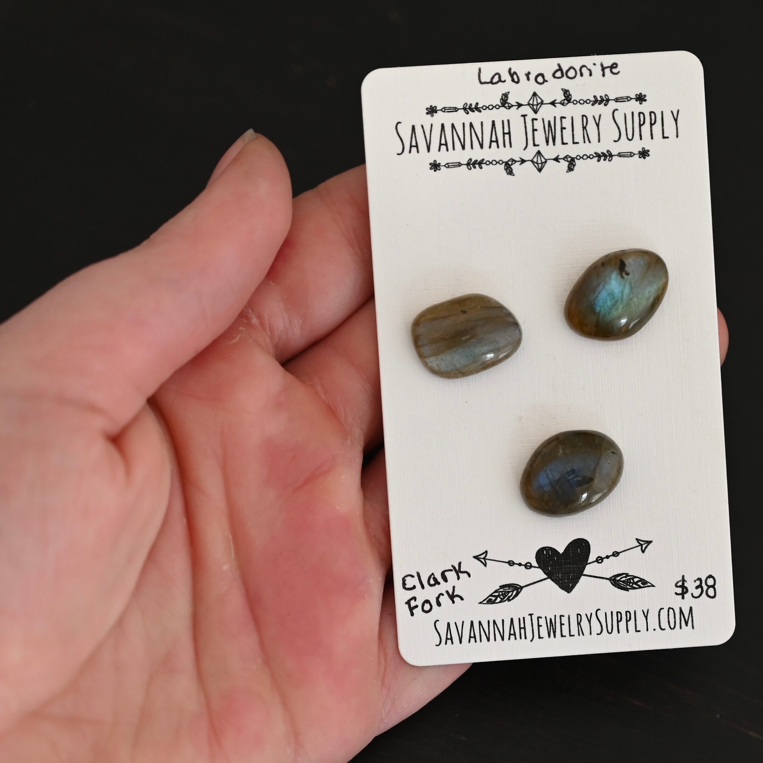 Clark Fork River Labradorite Cabochon Parcel shown in hand