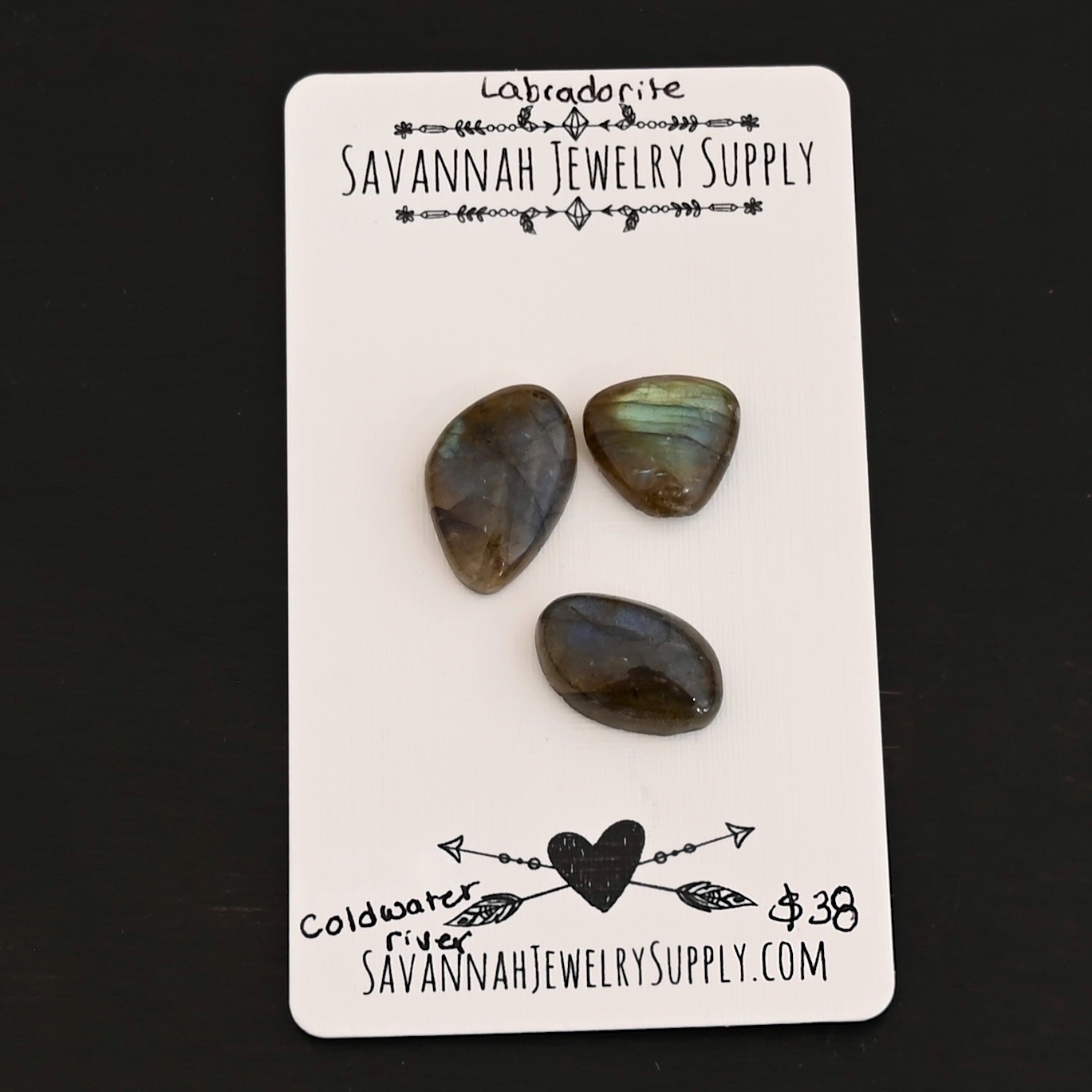 Coldwater River Labradorite Cabochon Parcel shown on business card