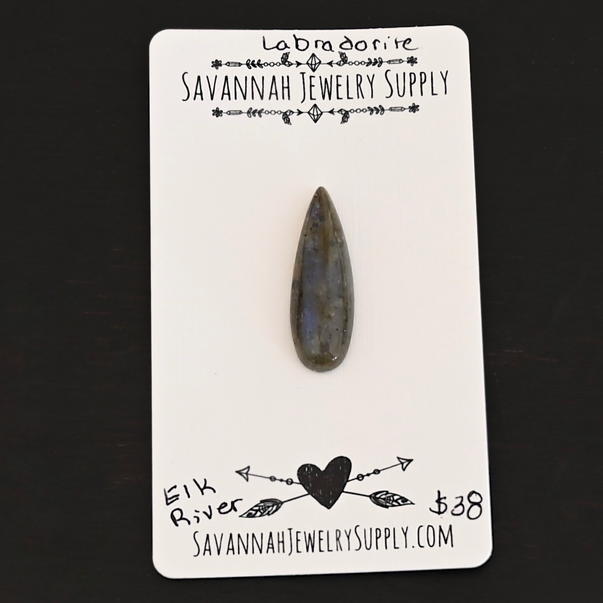 Elk River Labradorite Cabochon Parcel shown on business card