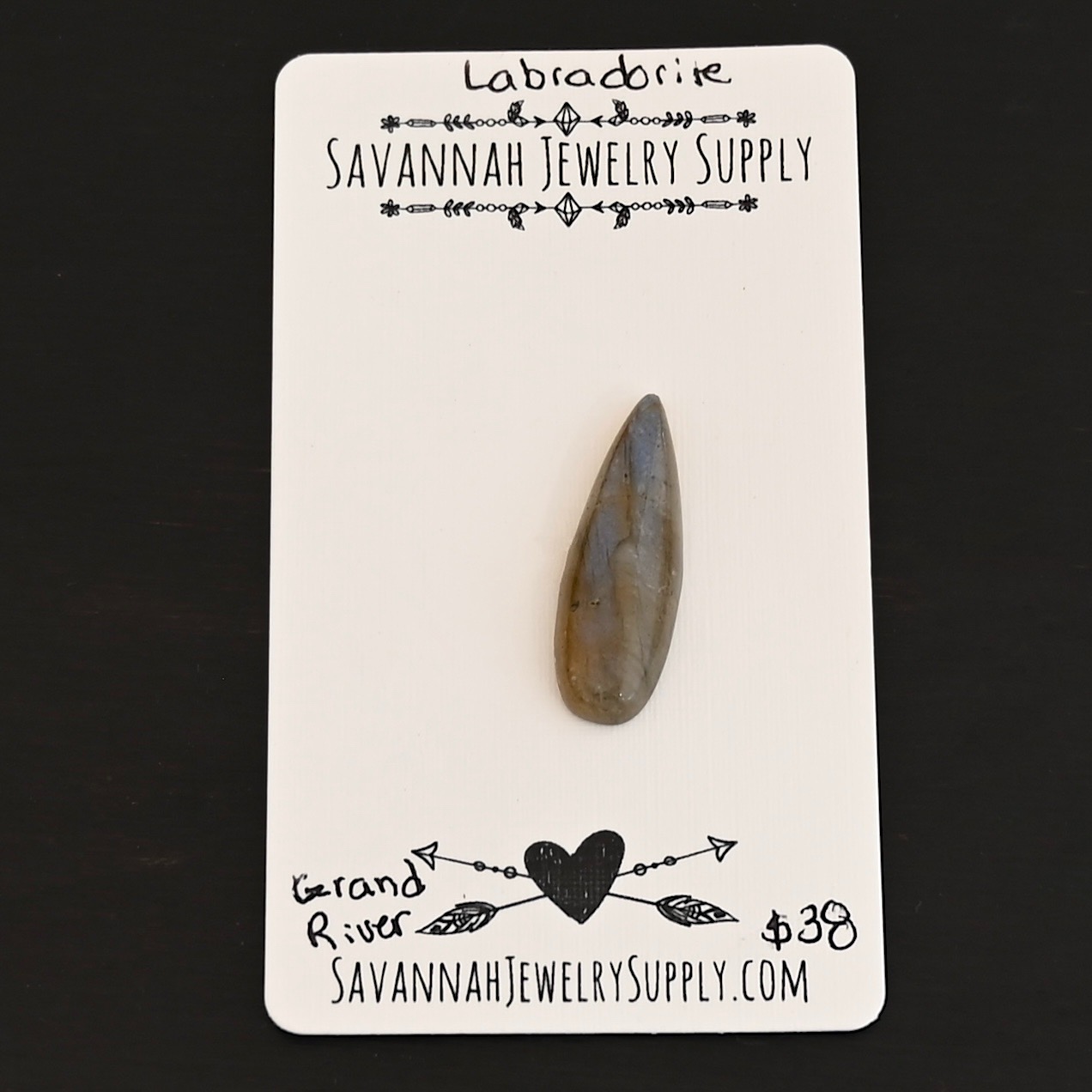 Grand River Labradorite Cabochon Parcel shown on business card