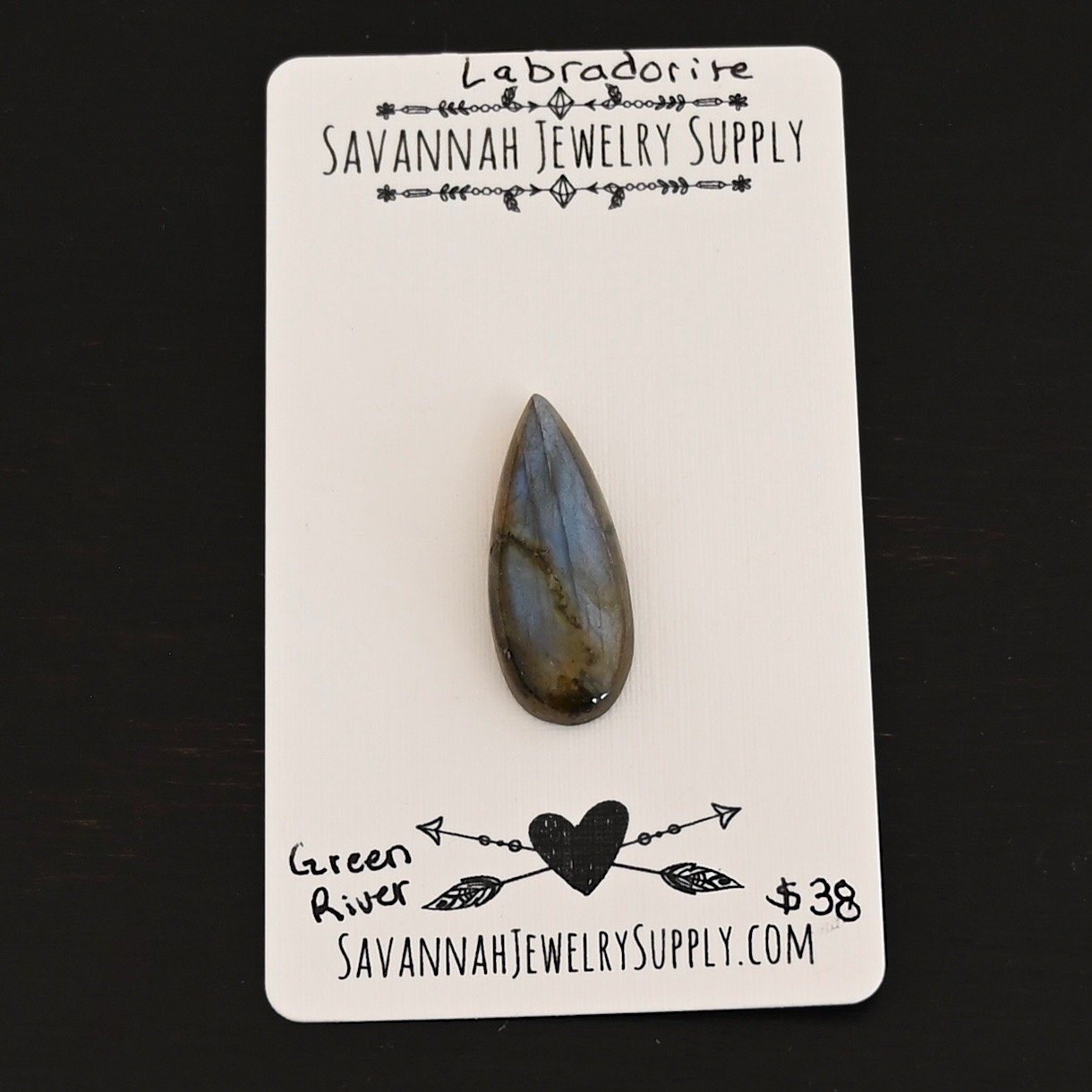 Green River Labradorite Cabochon Parcel shown on business card