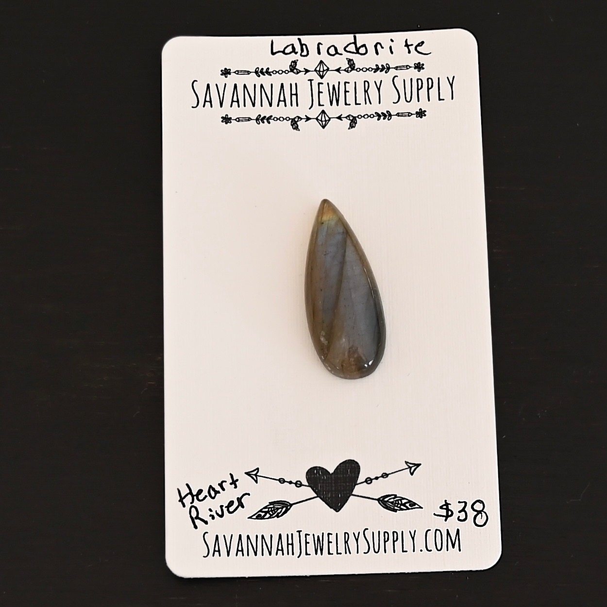 Heart River Labradorite Cabochon Parcel shown on business card
