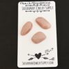 Mint Rose Cut Peach Moonstone Cabochon Parcel shown on business card