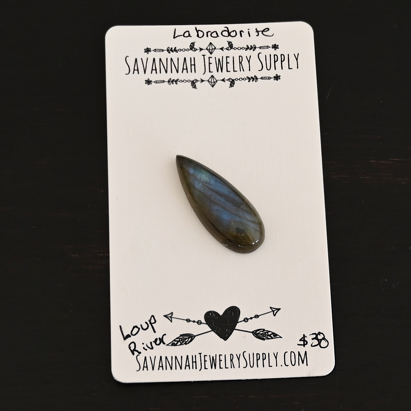 Loup River Labradorite Cabochon Parcel shown on business card