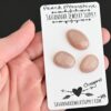 Oregano Rose Cut Peach Moonstone Cabochon Parcel shown in hand