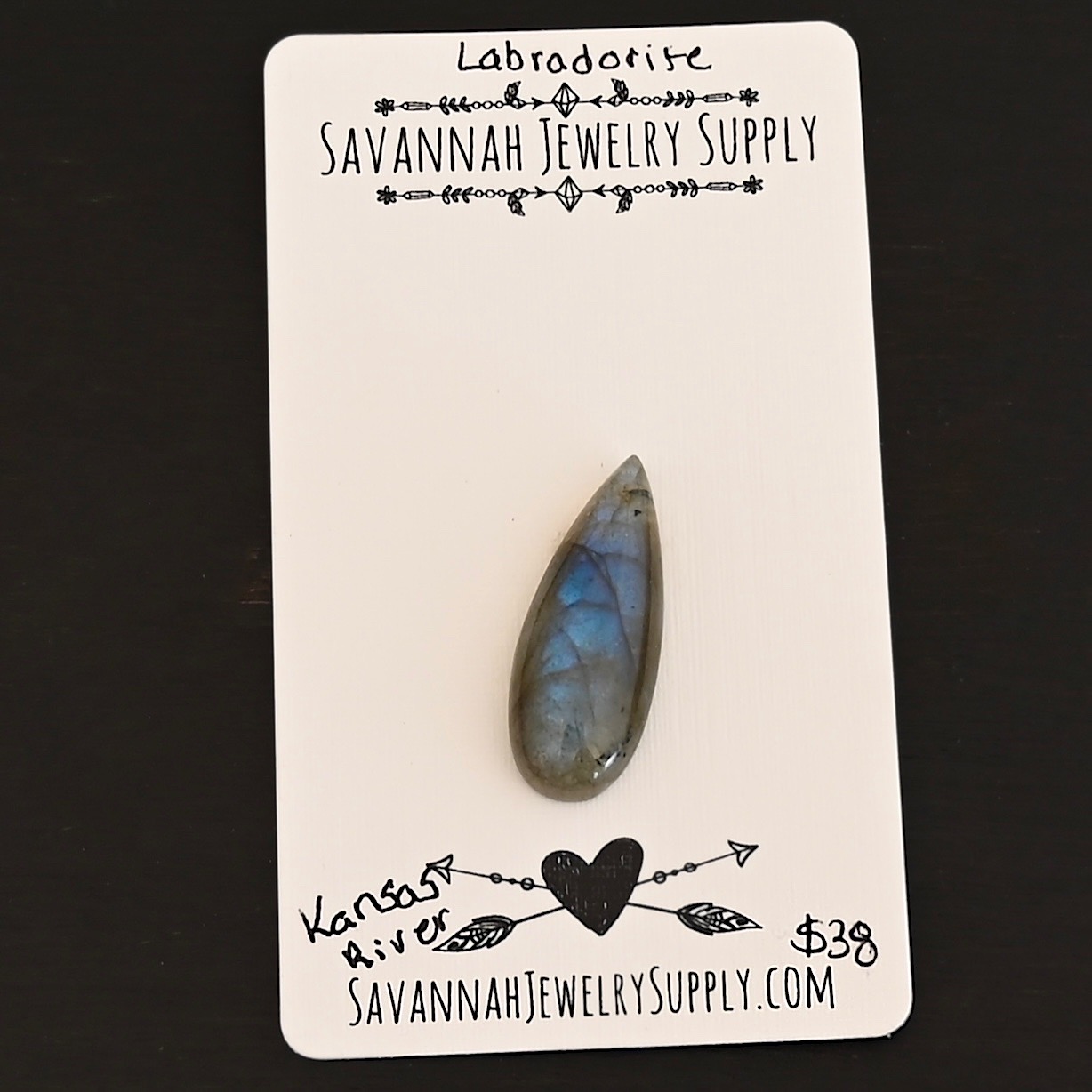 Kansas River Labradorite Cabochon Parcel shown on business card