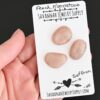 Saffron Rose Cut Peach Moonstone Cabochon Parcel shown in hand