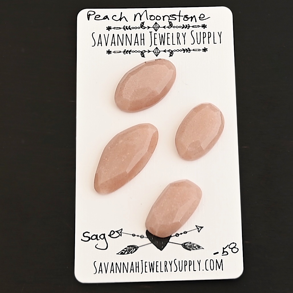 Sage Rose Cut Peach Moonstone Cabochon Parcel shown on business card