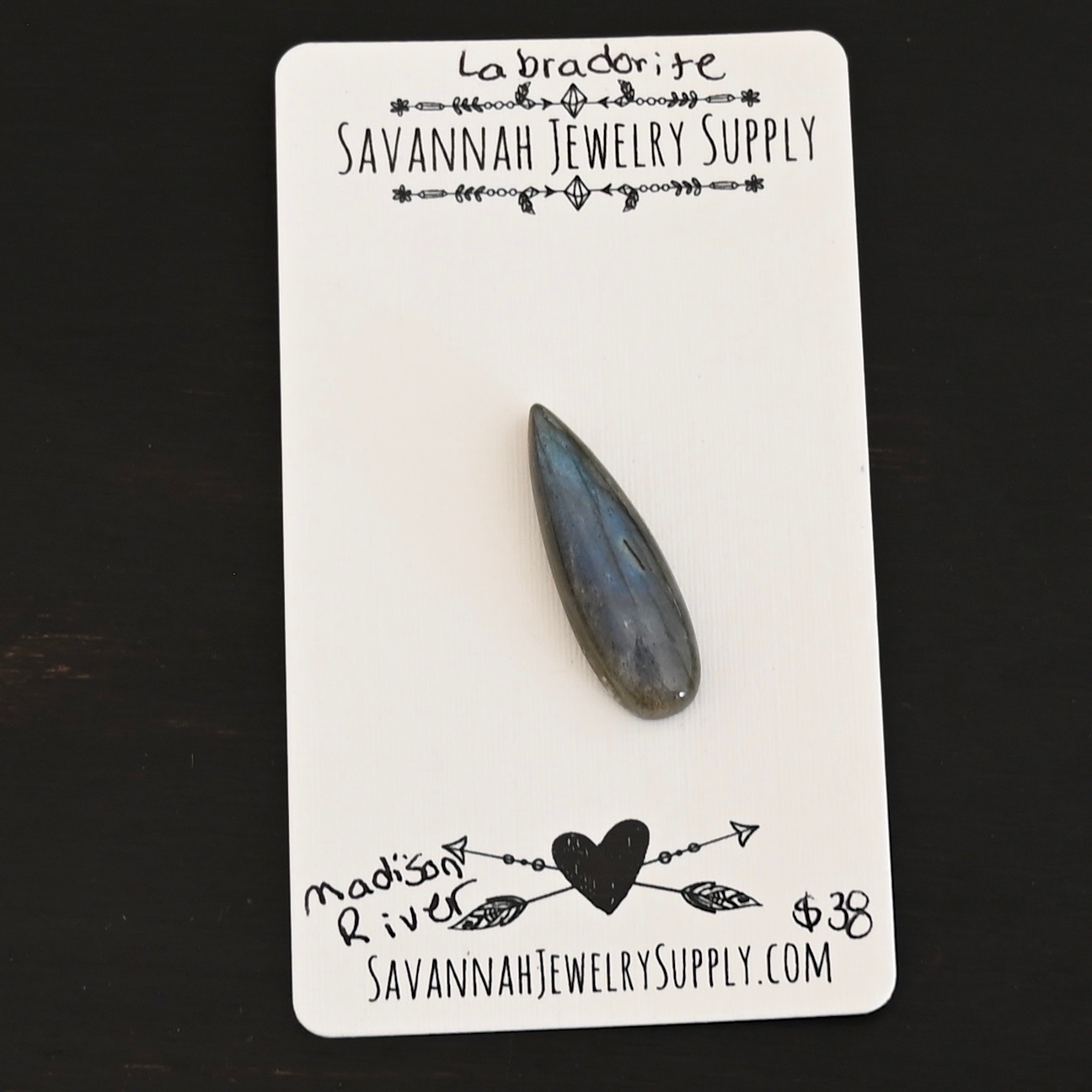 Madison River Labradorite Cabochon Parcel shown on business card