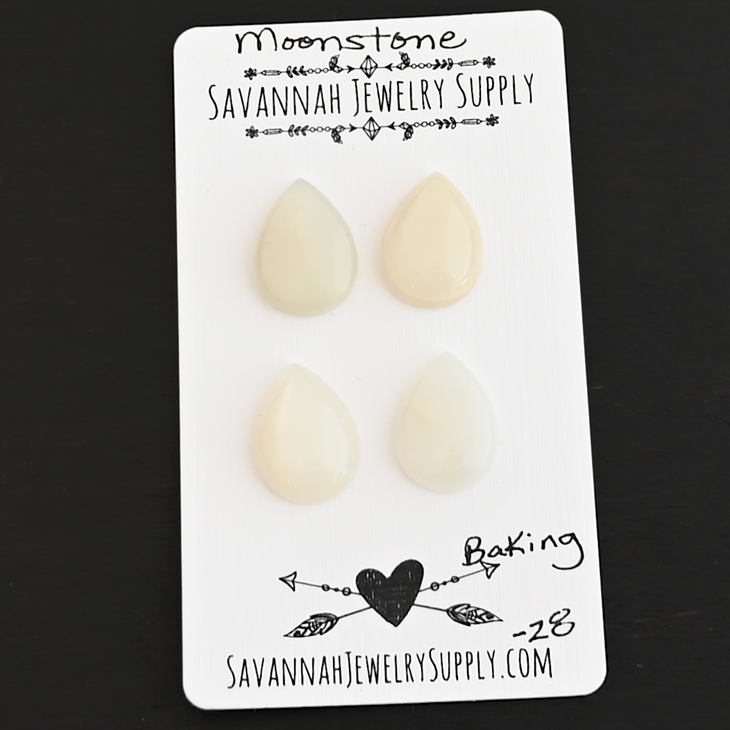 Baking Moonstone Cabochon Parcel shown on business card