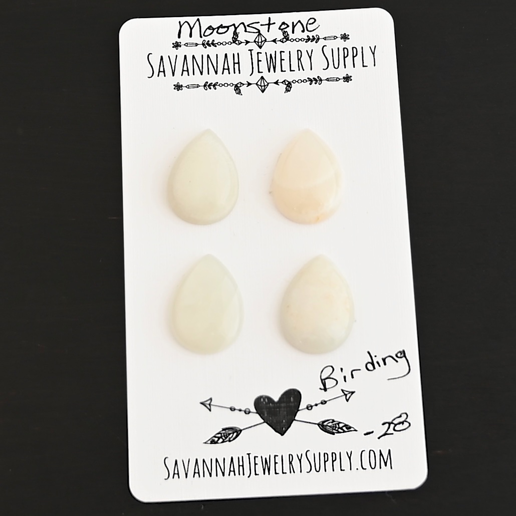 Birding Moonstone Cabochon Parcel shown on business card