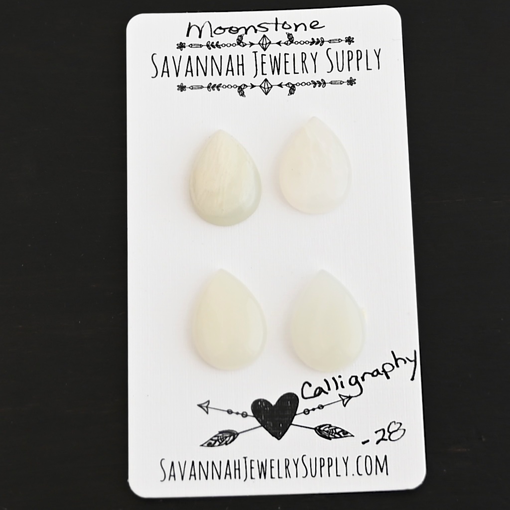 Calligraphy Moonstone Cabochon Parcel shown on business card