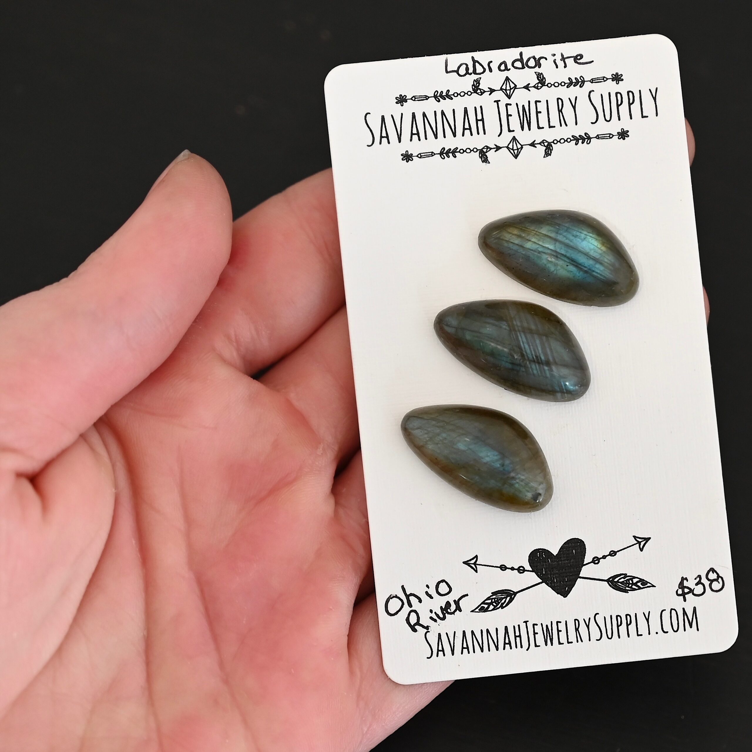 Ohio River Labradorite Cabochon Parcel shown in hand