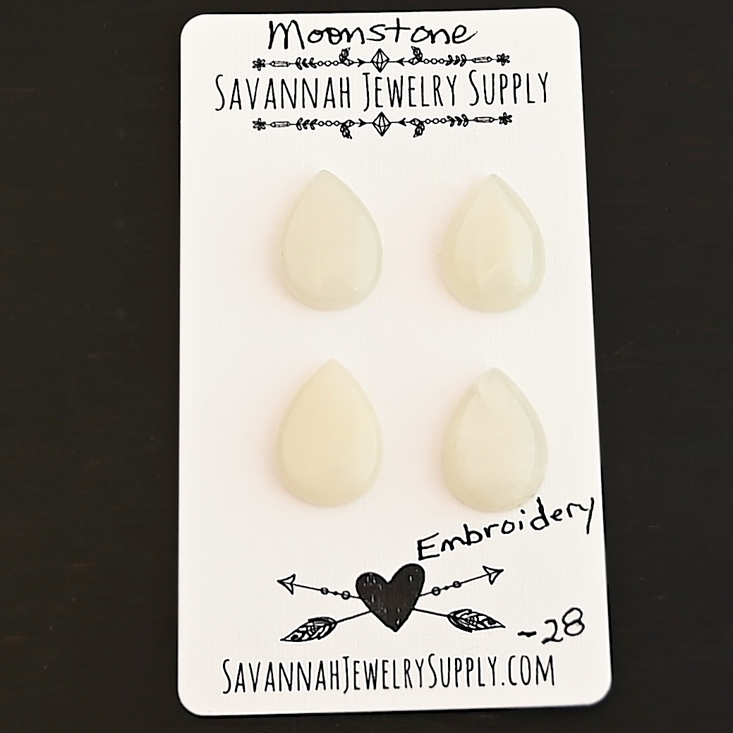 Embroidery Moonstone Cabochon Parcel shown on business card