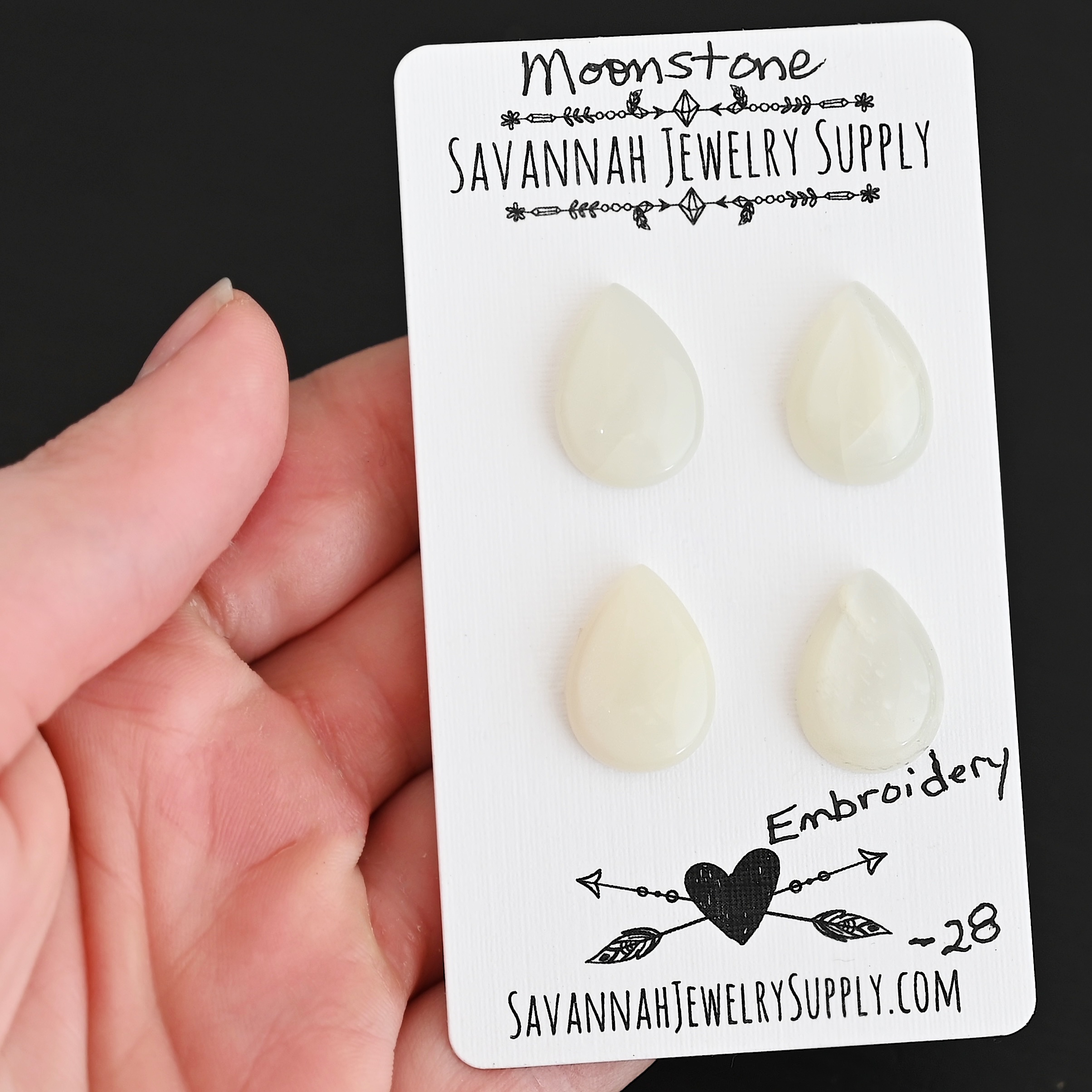 Embroidery Moonstone Cabochon Parcel shown in hand