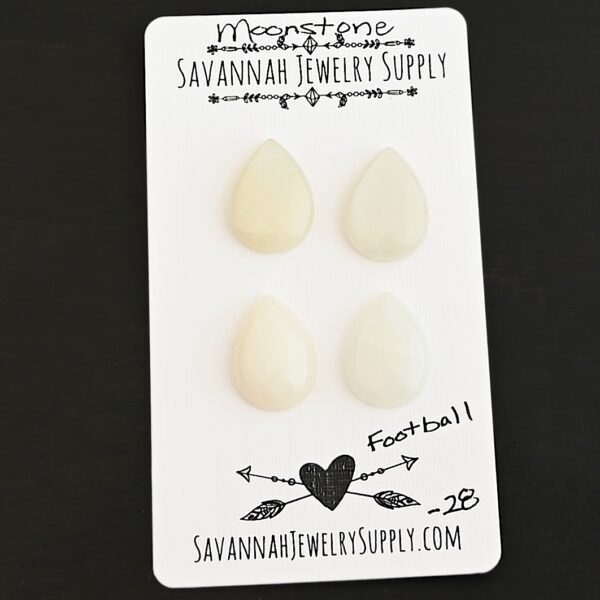 Football Moonstone Cabochon Parcel shown on business card