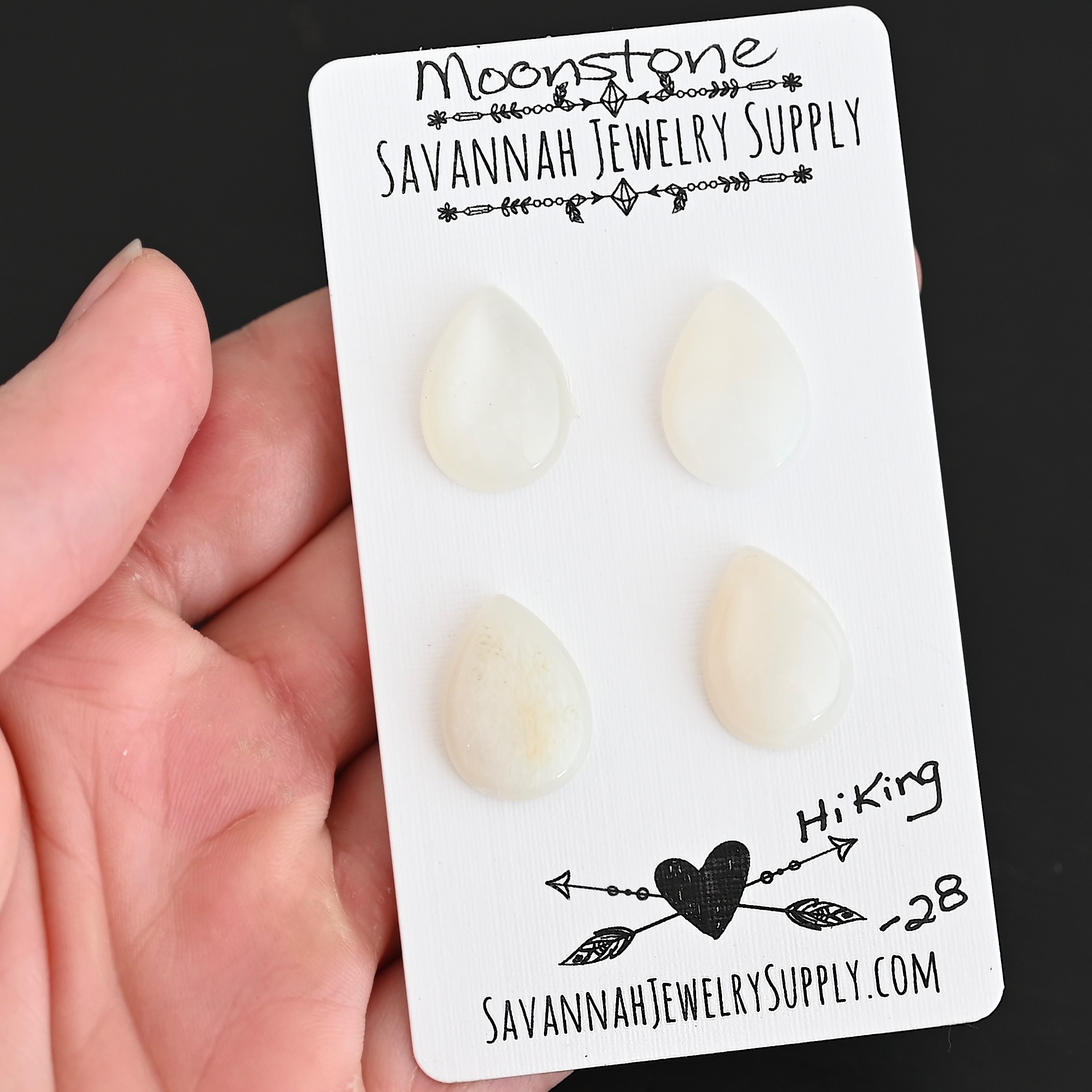 Hiking Moonstone Cabochon Parcel shown in hand