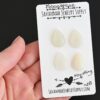 Kayaking Moonstone Cabochon Parcel shown in hand