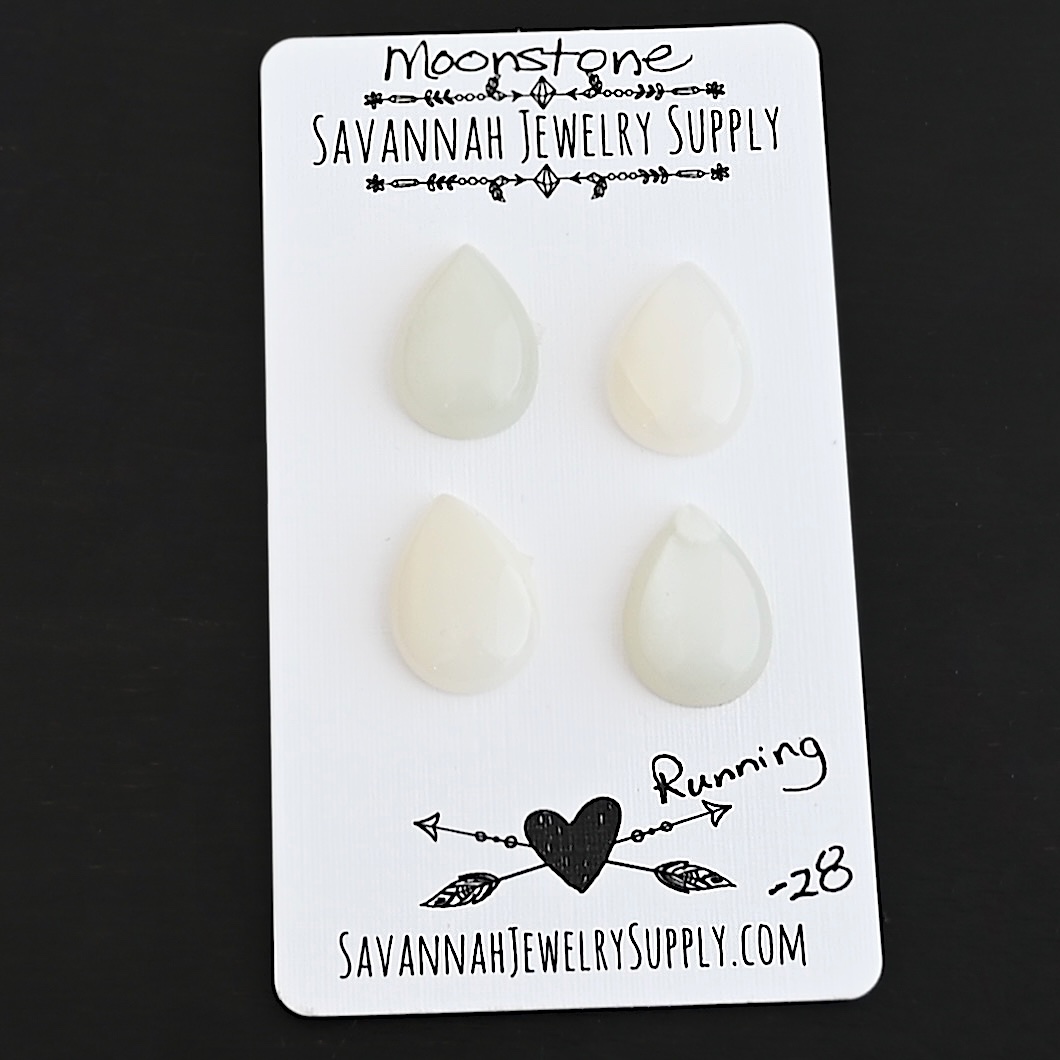 Running Moonstone Cabochon Parcel shown on business card